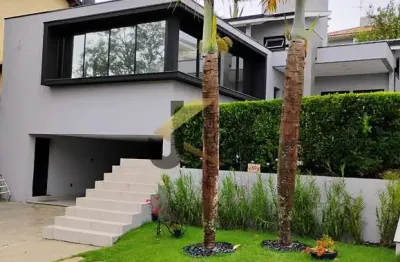 Casa à venda em condomínio de valinhos, 3 suítes (1 master com closet), 6 garagens. com 3 salas, lavabo, ampla cozinha, despensa, churrasqueira com fo