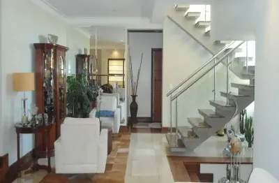 Casa a venda no alphaville campinas com 4 suítes (1 máster), lazer e garagem para vários carros