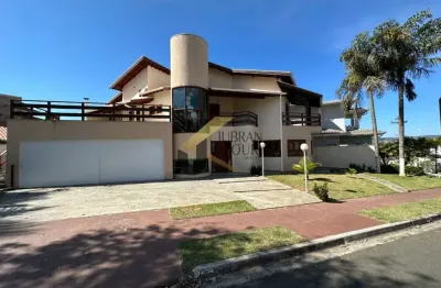 Casa à venda no condomínio terras do oriente - valinhos, com 5 suítes (1 térrea), lazer e garagem para vários carros
