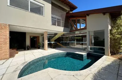 Casa `venda em condominio de sousas essa incrível casa  estilo moderno com um ótimo lazer! com 4 suítes, esta residência oferece todo o conforto e privacidade que você e sua família estão procurando.