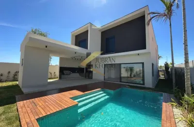 Casa à venda em condomínio - campinas, com 4 suítes (1 máster), lazer comum e garagem para vários carros.