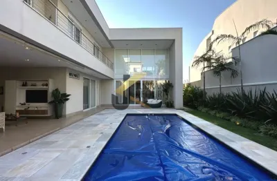 Casa à venda no alphaville campinas com 4 suítes, lazer privativo e garagem para vários carros