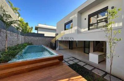 Casa à venda no alphaville d. pedro - campinas, 4 suítes com closet, lazer privativo e garagem para 4 carros