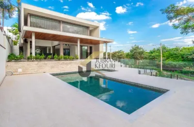 Casa em condomínio à venda na região do shopping galeria - campinas, com 4 suítes, lazer comum e garagem com ponto de carregamento de carro elétrico.