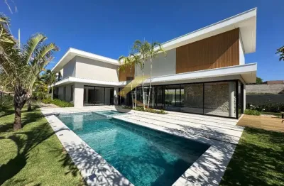 Casa em condomínio à venda em sousas - campinas, com 4 suítes (1 máster), lazer comum e garagem para 5 carros.