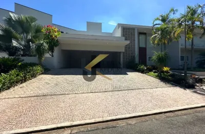 Casa em condomínio à venda no residencial villa lombarda - valinhos, 4 suítes com closet (1 térrea), lazer comum e garagem para 6 carros com oficina.