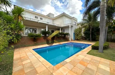 Casa à venda no alphaville dom pedro - campinas/sp, com 4 suítes (1 máster com closet e hidro), lazer privativo e garagem para vários carros.