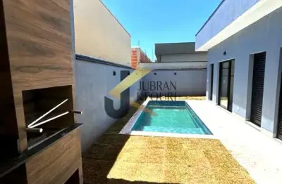 Casa à venda em condomínio paulínia-sp. com 3 suítes, sendo uma máster, living para 2 ambientes com pé direito alto, 5 banheiros, 4 vagas.