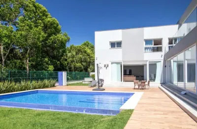 Casa em condomínio fechado com 5 quartos à venda na Rodovia Haroldo Soares Glavan, --, Cacupé, Florianópolis