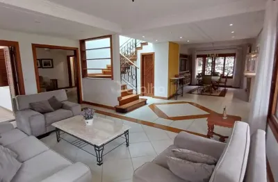 Casa residencial com 4 suítes e 385m² privativos em jurerê internacional, florianópolis