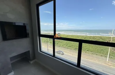 Apartamento novo, frente mar com 87m², 2 suítes e churrasqueira a carvão na meia praia - navegantes | adriano carpes imóveis vende!