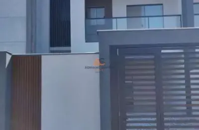 Sobrado de alto padrão, pronto para morar no bairro meia praia em navegantes a venda com adriano carpes imóveis