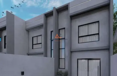 Sobrado com 2 suites - localização privilegiada, a apenas 700 metros da praia no centro de navegantes a venda com adriano carpes imóveis