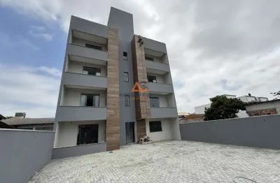 Apartamento de dois dormitórios, sendo uma suíte, sacada com churrasqueira e uma vaga de garagem no bairro de gravatá, em navegantes - adriano carpes imóveis vende