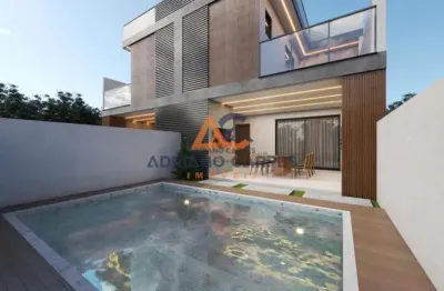 Sobrado com 3 suítes alto patrão com 2 vagas de garagem cobertas, piscina , no bairro Centro, Balneário Piçarras a venda pela Imobiliária Adriano Carpes