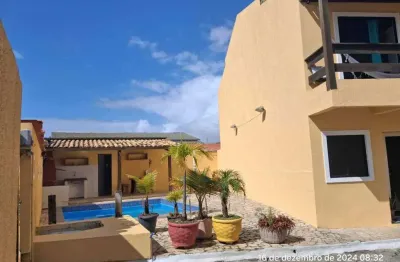 Casa térrea, tipo village, 2/4, 1 vaga, condomínio próximo a praia de ipitanga, stella maris, salvador/ba.