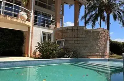 Casa com 4 dormitórios à venda, 630 m² por r$ 4.800.000,00 - condomínio flamboyant - atibaia/sp