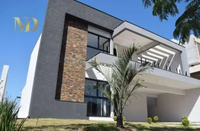Casa com 4 dormitórios à venda, 305 m² por r$ 2.890.000,00 - condomínio figueira garden - atibaia/sp