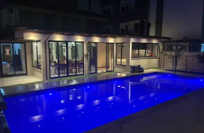 Excelente casa  4  dormitórios, temporada de verão, com piscina, para 14 pessoas