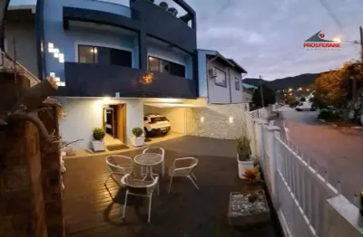 Casa com 4 quartos à venda na rua ilha dos corais, 64, vargem do bom jesus, florianópolis por r$ 900.000