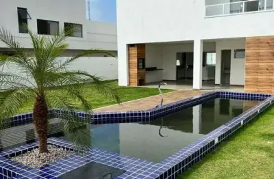 Vendo casa nova recém construída com 50mm2, piscina privativa, espaço gourmet , área verde, jardim, 4 suítes no condomínio parque de jacuípe com rio e mar para ir andando.
