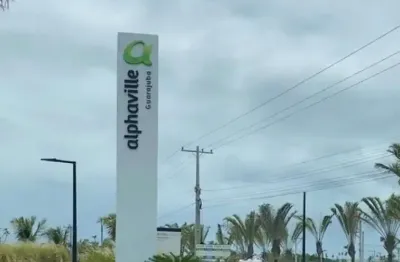 Terreno à venda no alphaville guarajuba, 765 m² por r$ 855.000 - alphaville guarajuba