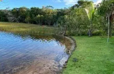 Oportunidade ! lote beira lago , cercado de muito verde, lagoa aruá - praia do forte/ba