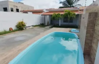 Casa 3/4 sendo 1 suíte. piscina. condomínio canto de arembepe. próximo ao rio e ao mar
