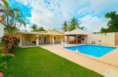 Venha viver o estilo de vida dos seus sonhos nesta deslumbrante casa térrea de 4 quartos, sendo 3 suítes, localizada na renomada praia de guarajuba.