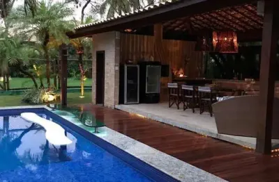 Apresentamos uma esplêndida casa à venda no exclusivo condomínio casas de praia do forte.