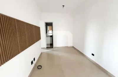 Apartamento 2 dormitórios com vaga de garagem e varanda com móveis planejados