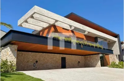 Imponente mansão de 8 quartos e 8 suítes na riviera, bertioga-sp, com 5 salas, 24 vagas e 1.000m² de