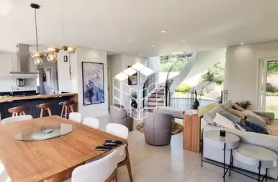 Casa em condomínio fechado com 4 quartos à venda na rodovia haroldo soares glavan, 4690, cacupé, florianópolis por r$ 5.300.000