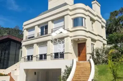 Casa em condomínio fechado com 4 quartos à venda na rodovia haroldo soares glavan, 4690, cacupé, florianópolis por r$ 5.300.000