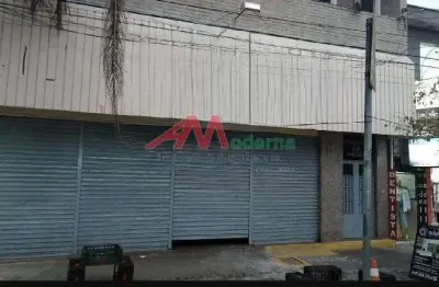 Amplo salão comercial (era a igreja   universal) calçadão próximo a  estação ferroviária guapituba. terreno: 350,00 mtrs de construção. (porta na largura do imóvel) banheiro(s): feminino (s) e masculi