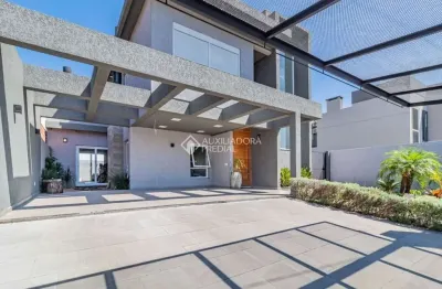 Casa com 3 quartos à venda na avenida bromélias, 456, parque da matriz, gravataí, 180 m2 por r$ 1.350.000