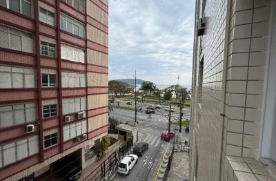 Apartamento de 2 dormitórios 55m² frente mar porteira fechada no gonzga