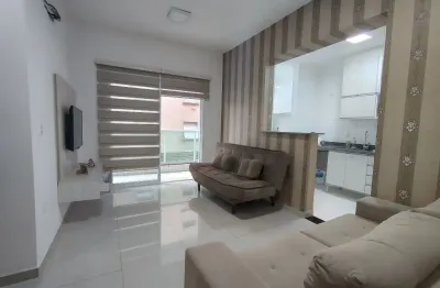 Apartamento de 1 dormitório 52m² no embaré com varanda e lazer