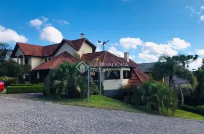 Casa em condomínio fechado com 3 quartos à venda na dos papagaios, 20, centro, canela, 370 m2 por r$ 3.000.000