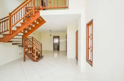 Casa em condomínio fechado com 3 quartos à venda na avenida vicente monteggia, 1020, cavalhada, porto alegre, 160 m2 por r$ 550.000