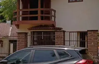 Casa em condomínio fechado com 4 quartos à venda na rua cangerana, 12, são lucas, viamão, 325 m2 por r$ 690.000