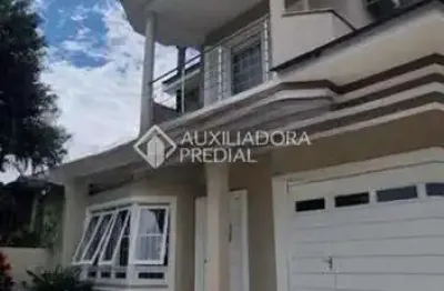 Casa com 3 quartos à venda na rua rodrigues da costa, 4090, sarandi, porto alegre, 260 m2 por r$ 1.350.000