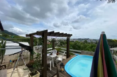 Casa com 3 quartos à venda na rua natércia cunha veloso, 267, morro santana, porto alegre, 270 m2 por r$ 798.000