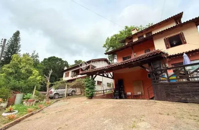 Casa em condomínio fechado com 4 quartos à venda na estrada dos alpes, 2345, cascata, porto alegre, 211 m2 por r$ 725.000