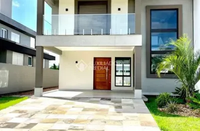 Casa em condomínio fechado com 3 quartos à venda na rua tulipa, 112, são vicente, gravataí, 180 m2 por r$ 1.500.000
