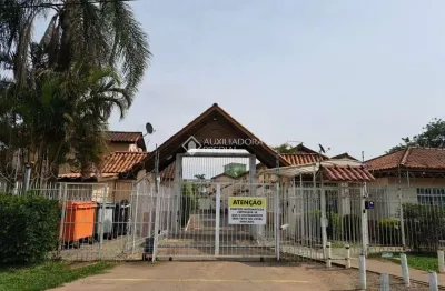 Casa em condomínio fechado com 3 quartos à venda na avenida joão ferreira jardim, 968, parque santa fé, porto alegre, 72 m2 por r$ 219.000