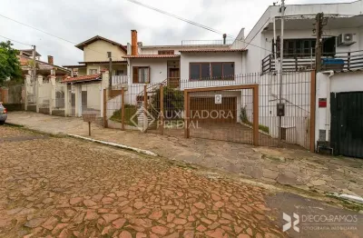 Casa em condomínio fechado com 4 quartos à venda na rua general sady cahen fischer, 55, costa e silva, porto alegre, 390 m2 por r$ 1.300.000