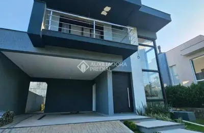 Casa em condomínio fechado com 4 quartos à venda na avenida senador salgado filho, 8500, centro, viamão, 330 m2 por r$ 1.990.000