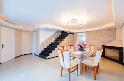 Casa com 3 quartos à venda na rua santo expedito, 63, parque santa fé, porto alegre, 260 m2 por r$ 852.000