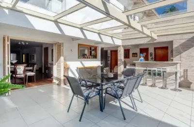 Casa em condomínio fechado com 5 quartos à venda na Rua Walir Zottis, 193, Jardim Itu Sabará, Porto Alegre, 327 m2 por R$ 1.250.000